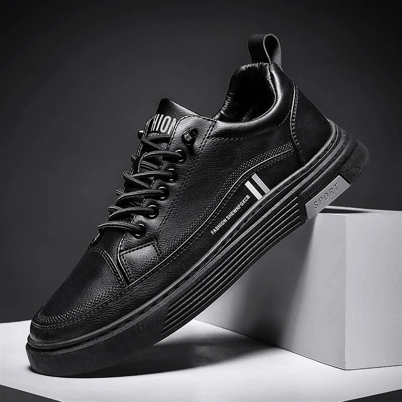 Men's white skate shoes with elastic band closure and low-top design showing stitching details