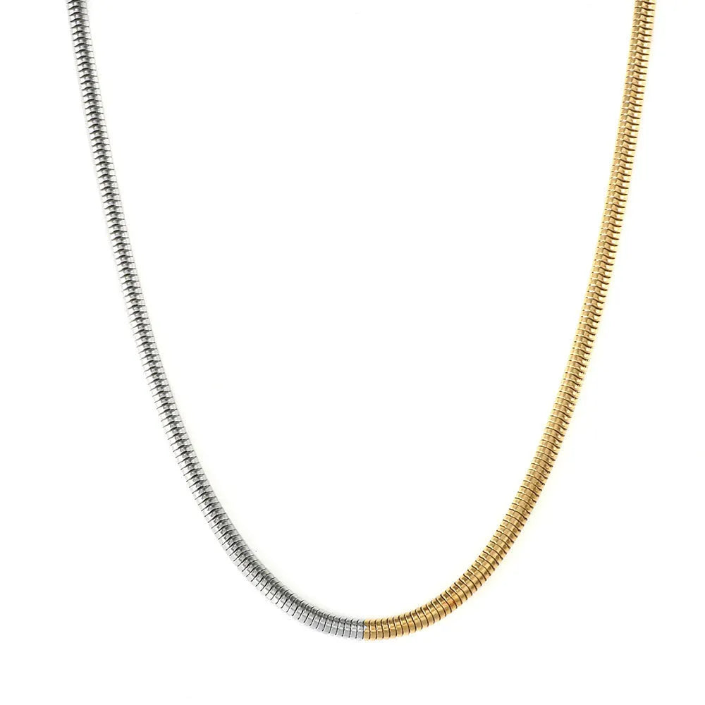 Golden 3mm thick stainless steel snake bone chain necklace for women.