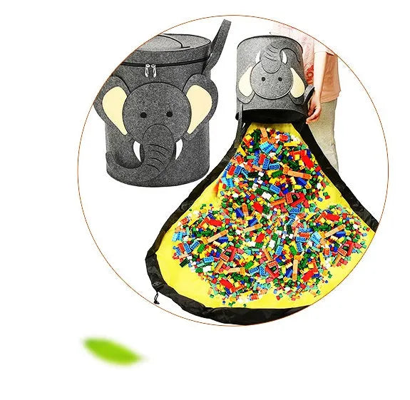 Green felt cube storage bag with pull rope, shown both as a flat play mat and gathered toy bag