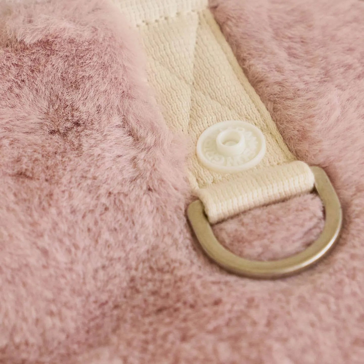 Light pink polyester warm coat for a dog or cat, showing casual costume style.