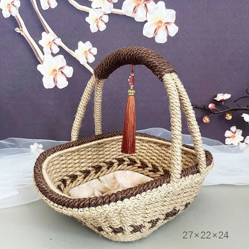 Coffee brown hand-woven straw basket with hemp rope accents measuring 19cm by 12cm
