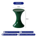 Creative hourglass-shaped plastic stool for changing shoes, shown in a green colour.