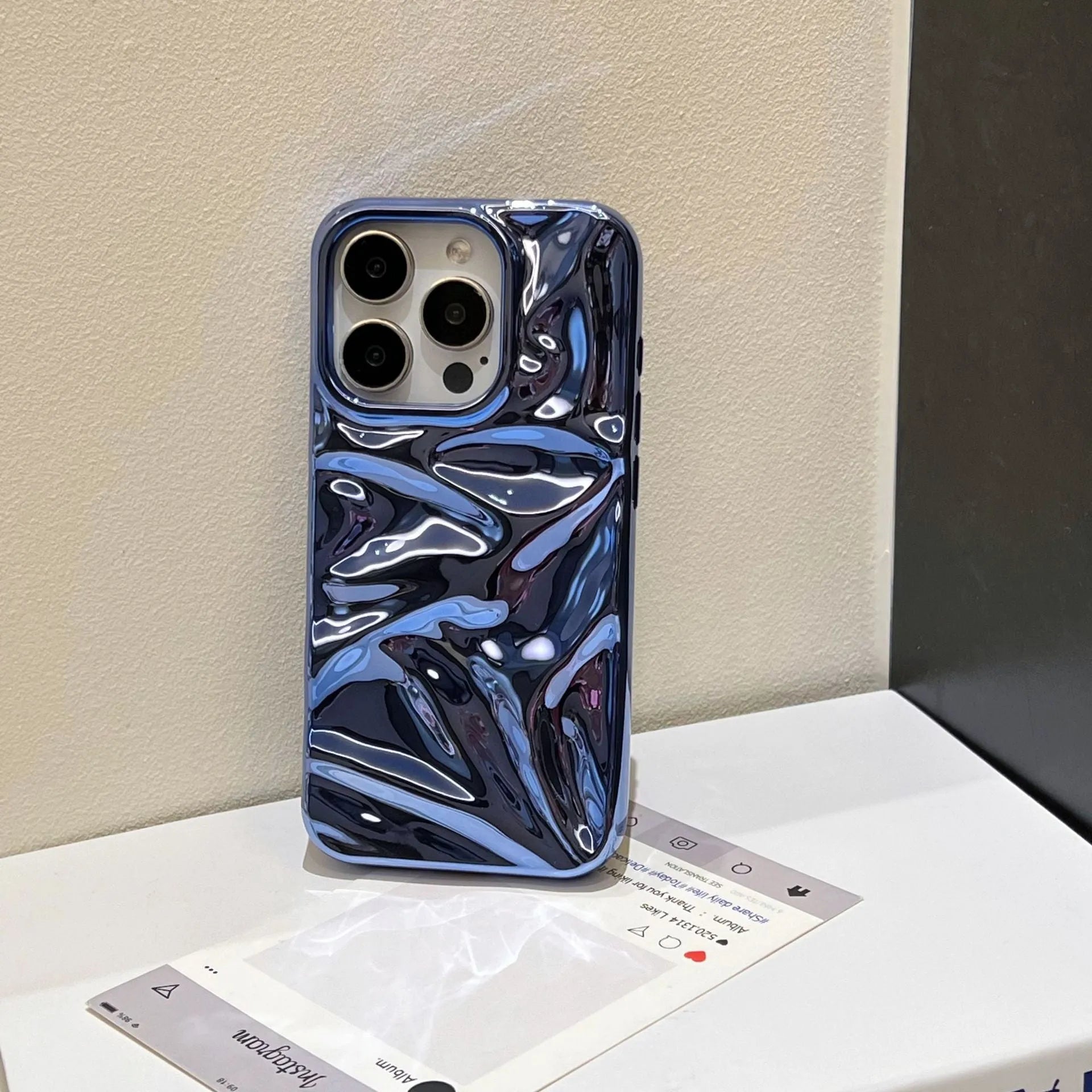Electroplated three-dimensional pleated TPU phone case for iPhone 11–16 Pro Max in milk blue colour