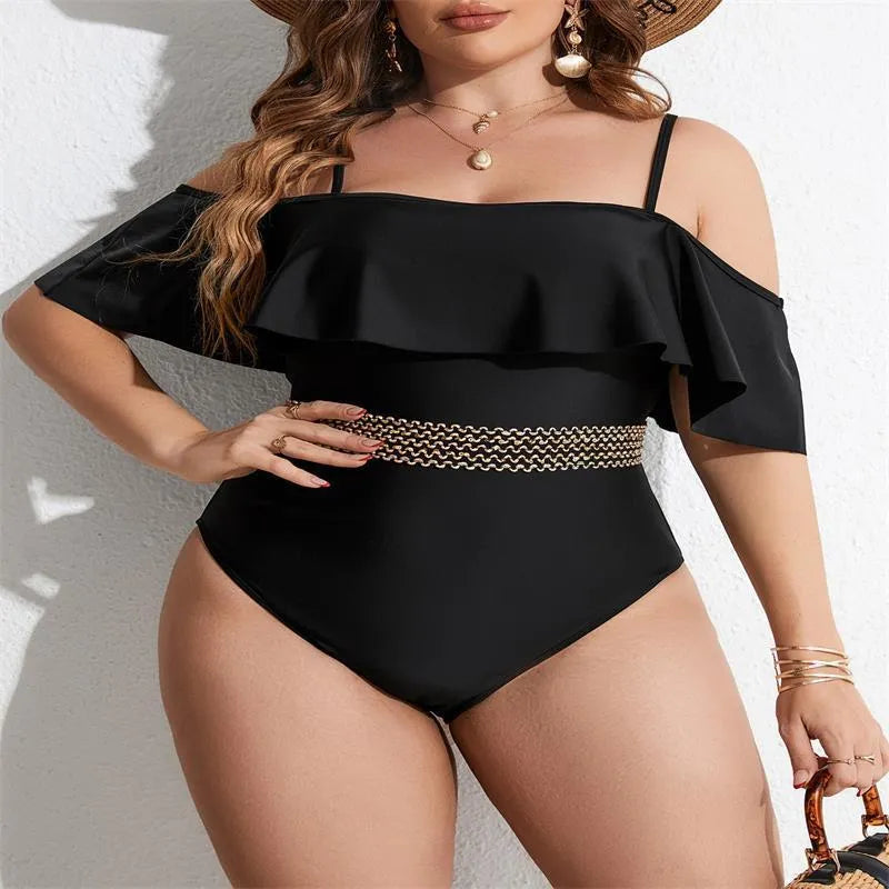 Black solid colour one-piece swimsuit for women in plus sizes on a mannequin.