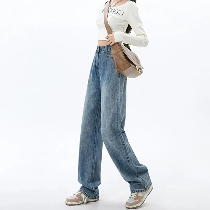 Women's retro blue high-waist wide-leg denim jeans laid flat
