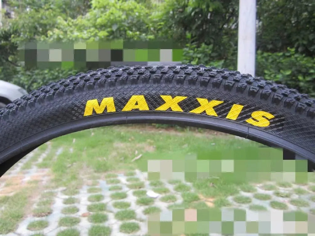 Mountain bike ultralight puncture proof tyre showing tread and sidewall, available in 26, 27.5, and 29-inch sizes.