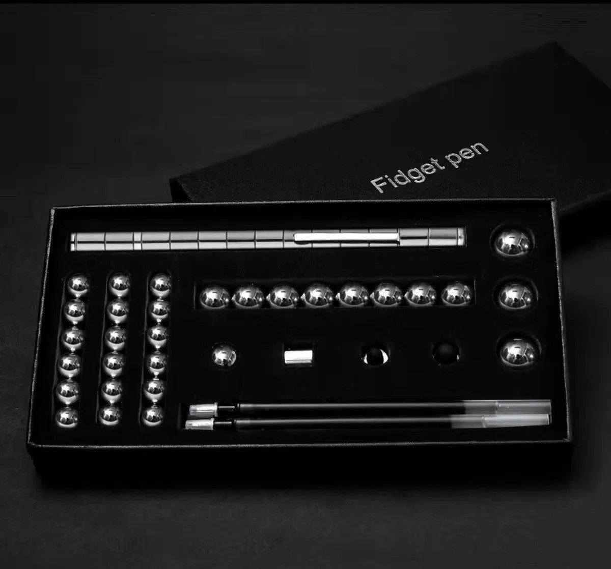Magnetic modular pen set in silver iron box with 13 rings, 12 balls, 3 refills, 2 capacitor heads, and upgraded magnets