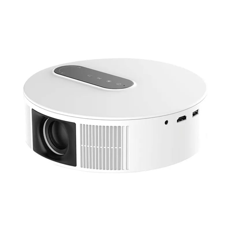 White HD projector unit with remote control on a table for home cinema use.