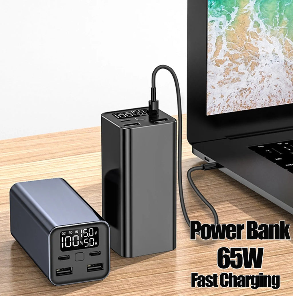 Black high-power 65W metal charging bank with 20000mAh capacity for laptop fast charging.
