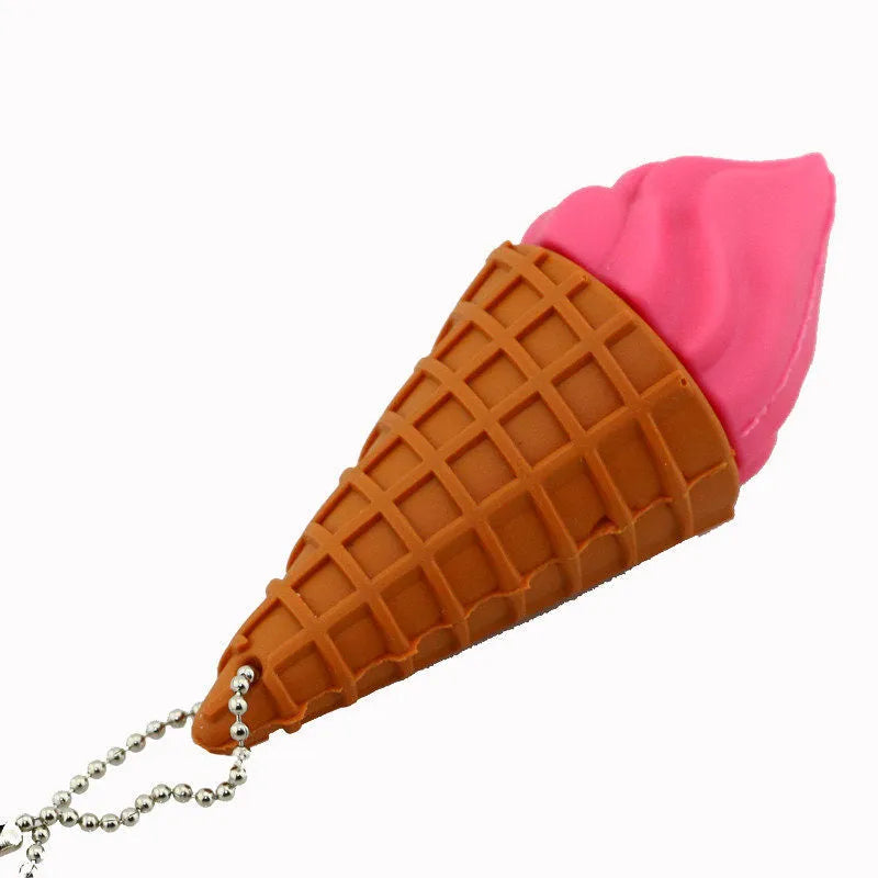 Pink mini ice cream topper USB flash drive on a white background.