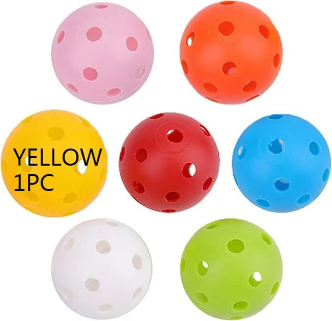 Multi-colour 42mm polyethylene golf practice balls in a net bag.