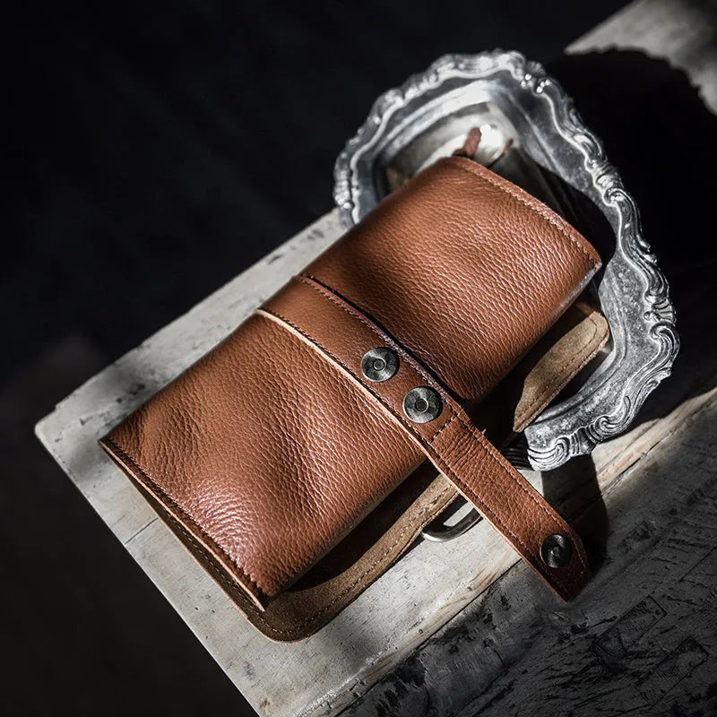 Handmade dark brown cow leather vintage bifold wallet with magnetic closure, shown open and closed.