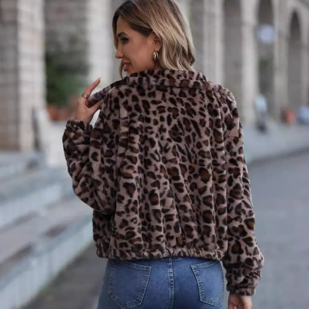 Women's loose leopard print plush coat with front zipper and raglan sleeves.