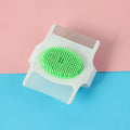 Blue and green 8.5cm dog grooming comb with floating hair removal and massage bristles