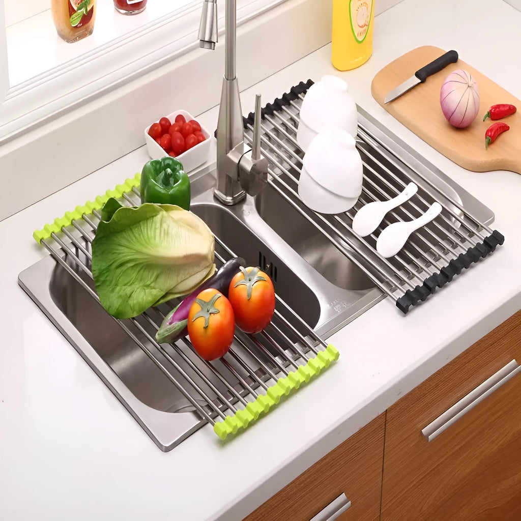 Folding stainless steel kitchen sink drying rack in red colour, shown extended for use.