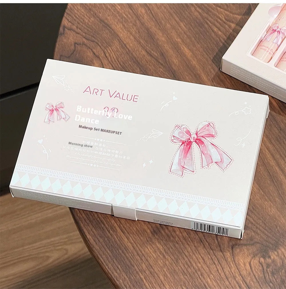 Pink Butterfly Box makeup set with four lip muds, a powder blusher, and a necklace