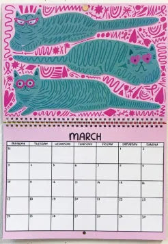 Large A3 cat-themed paper wall calendar for 2024 or 2025 displayed on a wall.