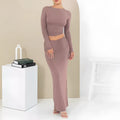 Women's sweet style polyester two-piece suit with three-quarter sleeve top and long skirt.