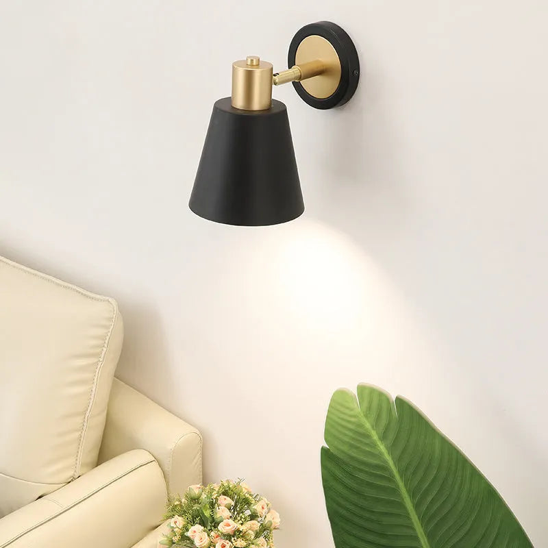 Nordic style iron wall lamp mounted on a wall, showcasing its solid construction and shade design.