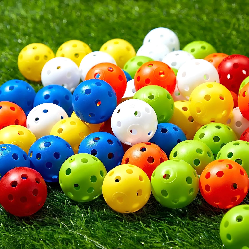 Multi-colour 42mm polyethylene golf practice balls in a net bag.