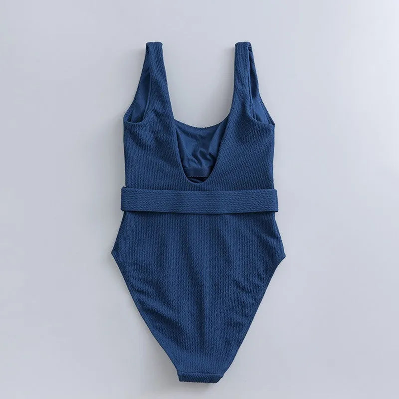 Navy blue solid colour one-piece swimsuit for women with a triangle style and built-in chest pad.