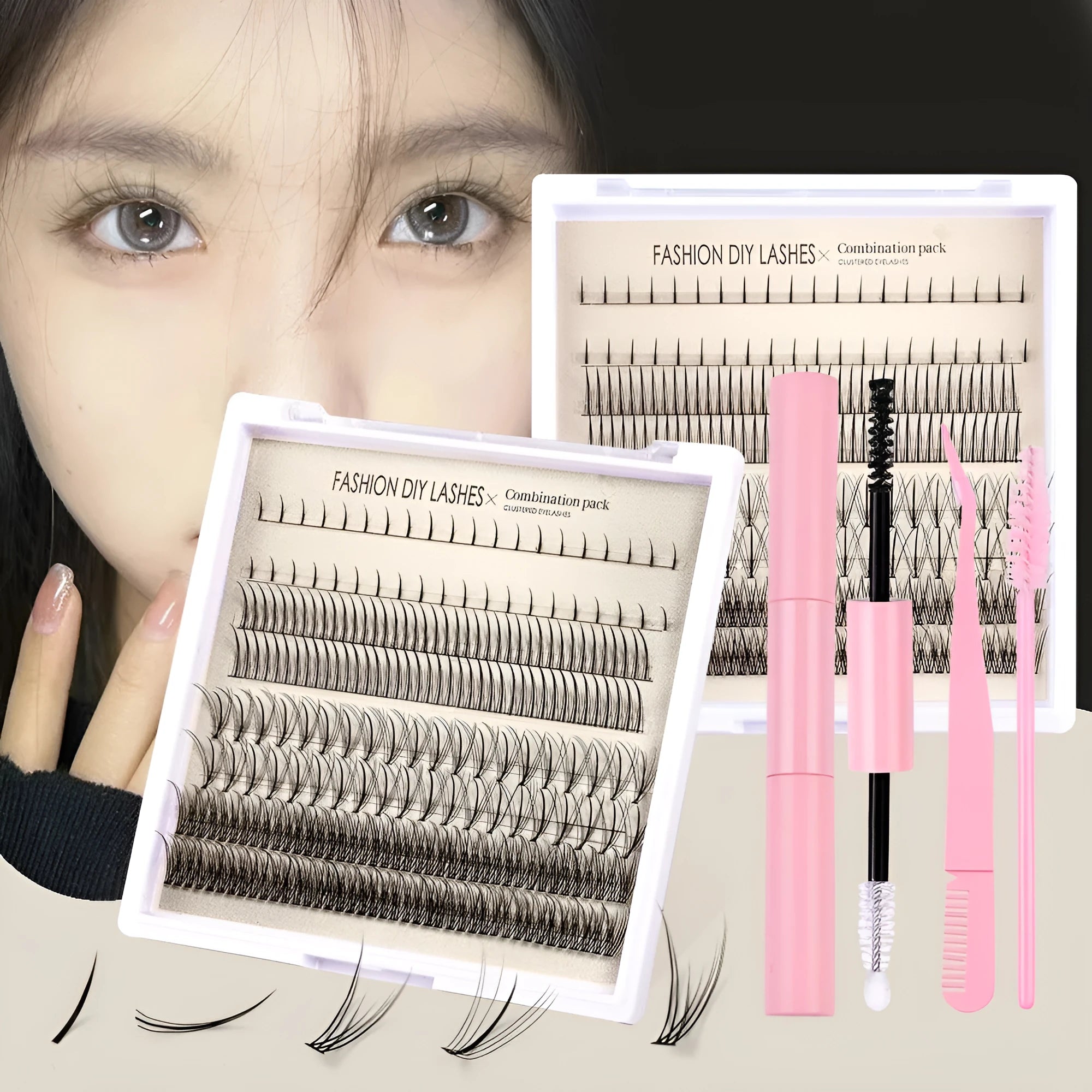 Segmented false eyelash kit open showing lashes, pink and black glue pots, tweezers, and an applicator brush.