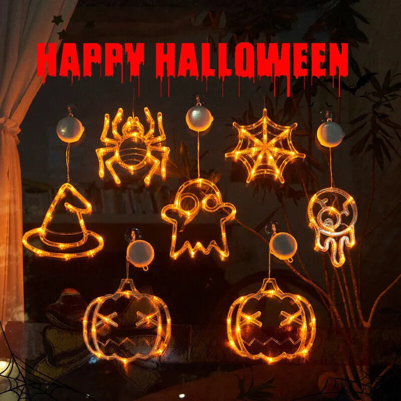 Halloween LED window lights with suction cups showing ghost, spider, and pumpkin decorations