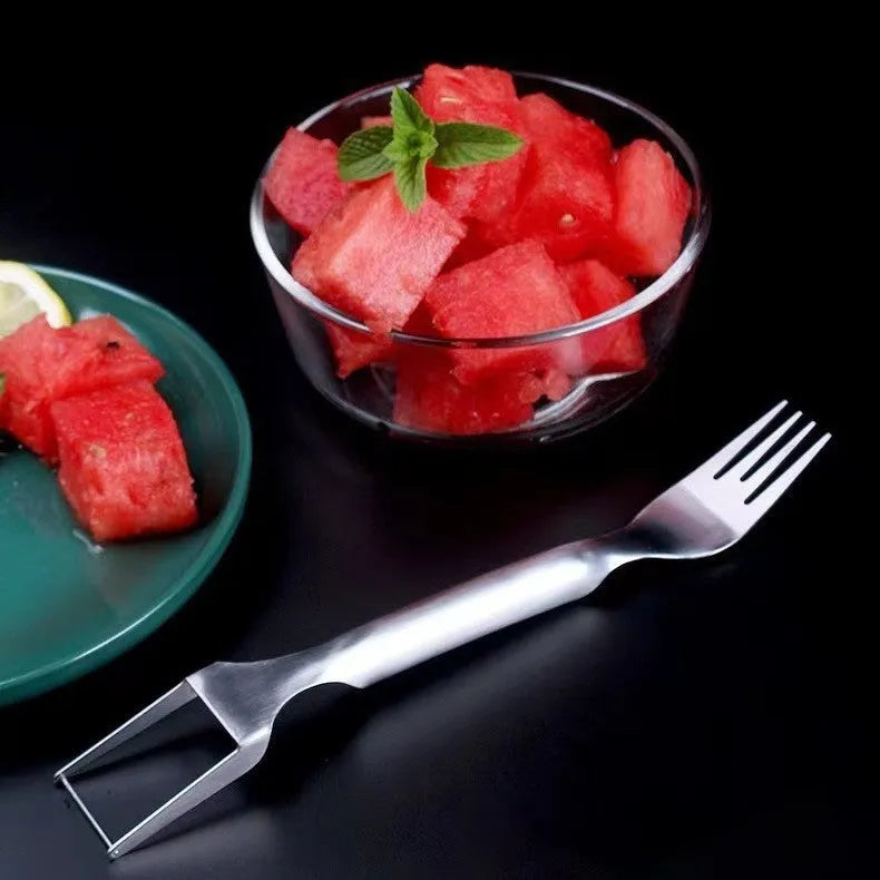 Stainless steel watermelon slicer with fork head showing 26cm length