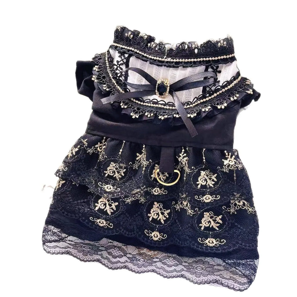 Golden gothic princess style skirt dress for a small dog on a mannequin, showing the skirted design.