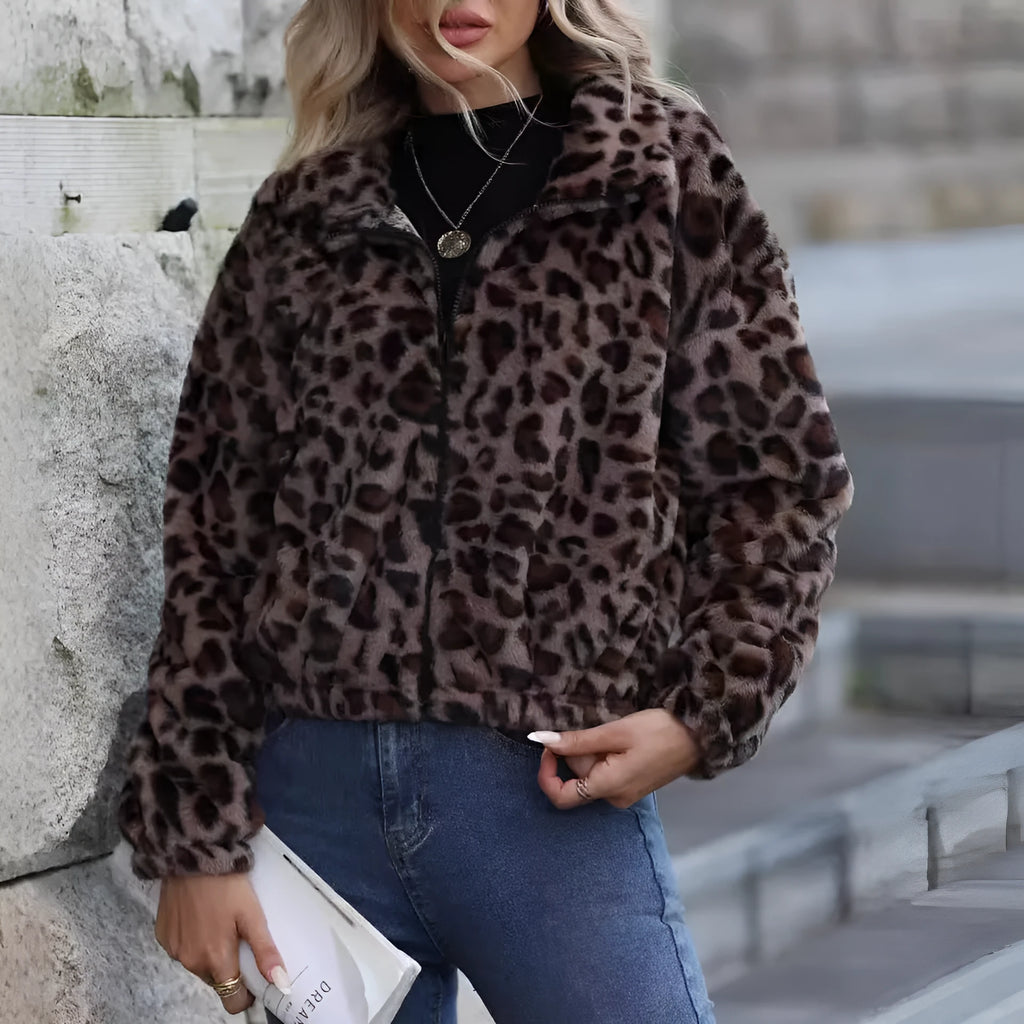 Women's loose leopard print plush coat with front zipper and raglan sleeves.