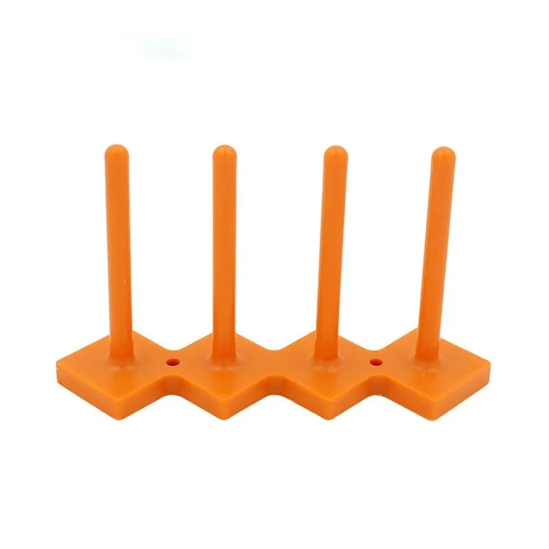 Plastic sewing machine bobbin storage rack with magnetic wire core bracket and four columns in blue, green, orange, red