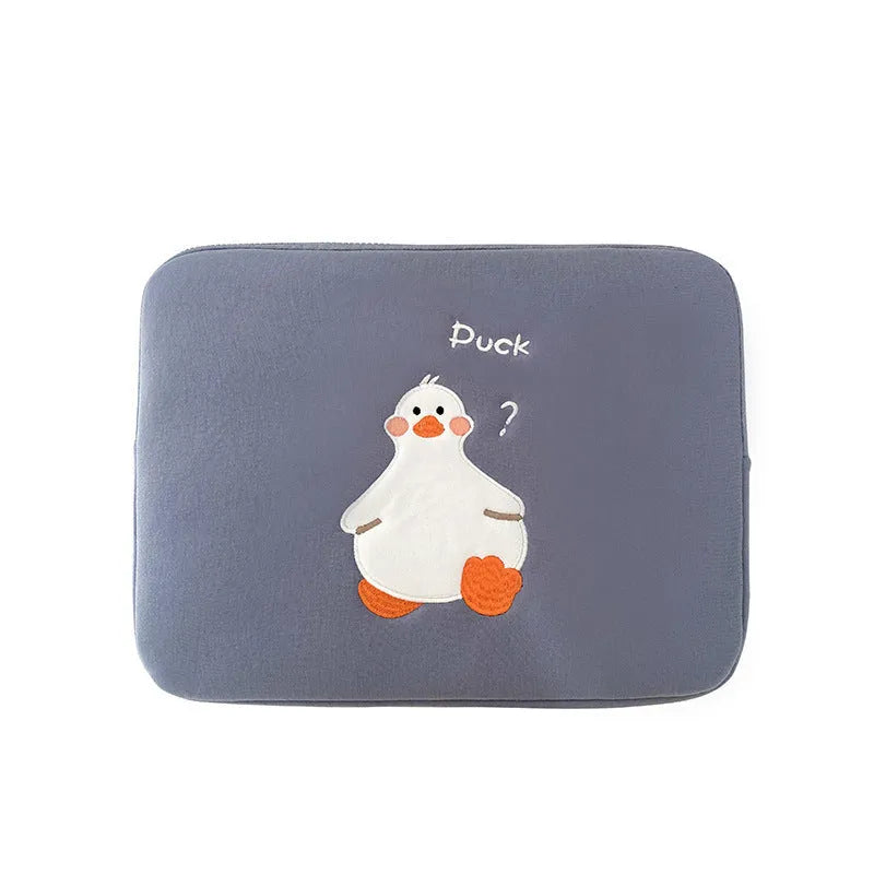 Blue cotton iPad case with embroidered cartoon duck design and a zipper.