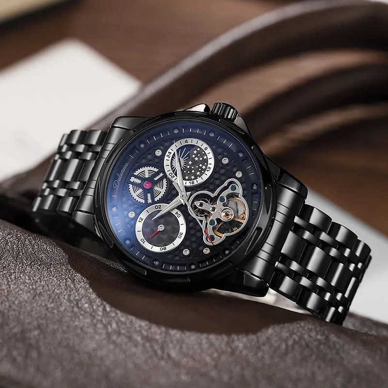 Men's automatic watch with luminous hands on a black dial, fitted on a stainless steel bracelet.