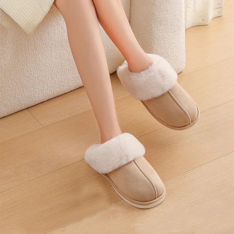 Women's plush winter slippers with artificial wool lining and a PVC sole in multiple colours.