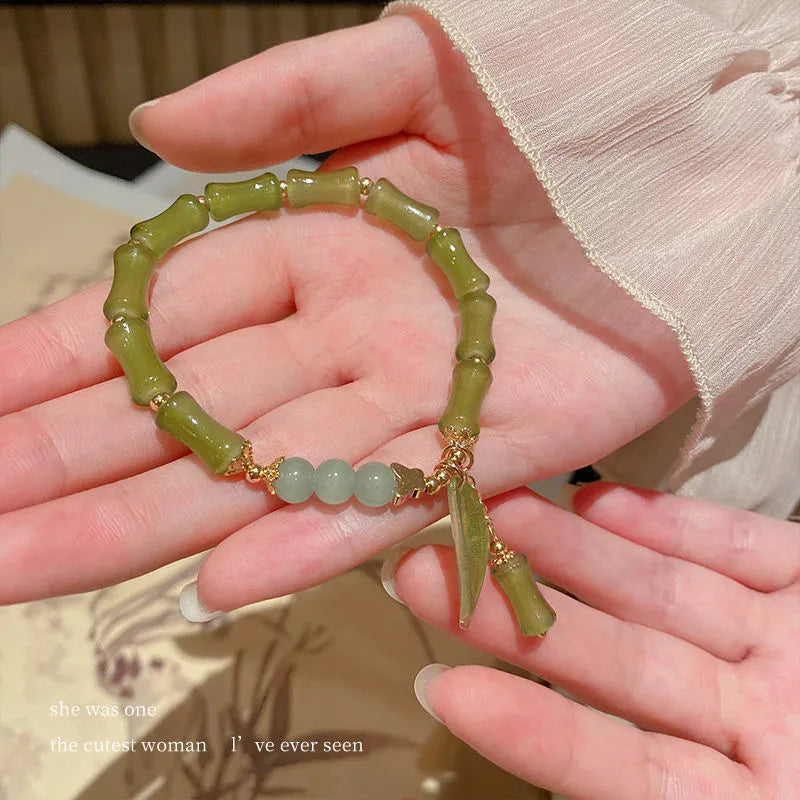 Chinese style glass bracelet with bamboo joint design elements in multiple colour options