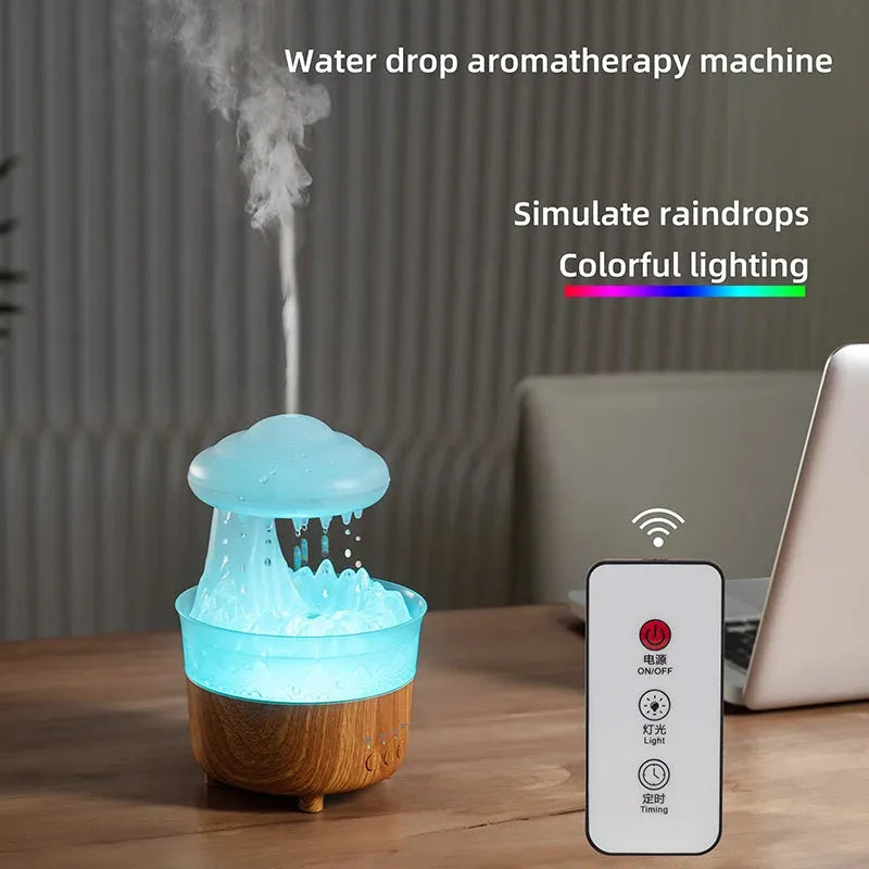 Wood grain white rain cloud-shaped ultrasonic humidifier diffuser with LED lights on a table.