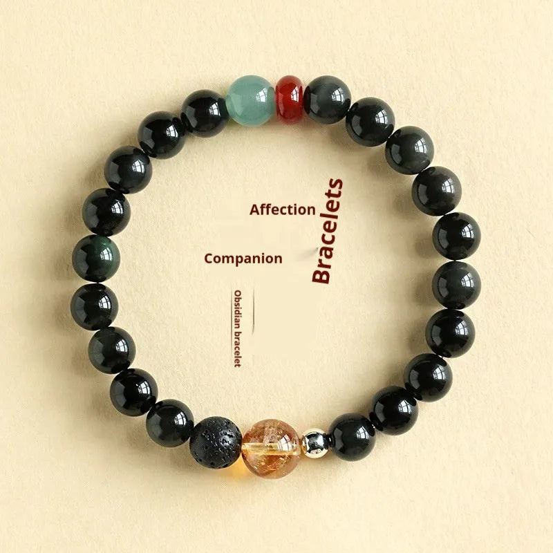 Chinese style obsidian and agate couple bracelet with yellow tower crystal and jade beads.