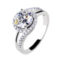 Diamond twist ring with small stones in white gold colour on copper base, adjustable opening