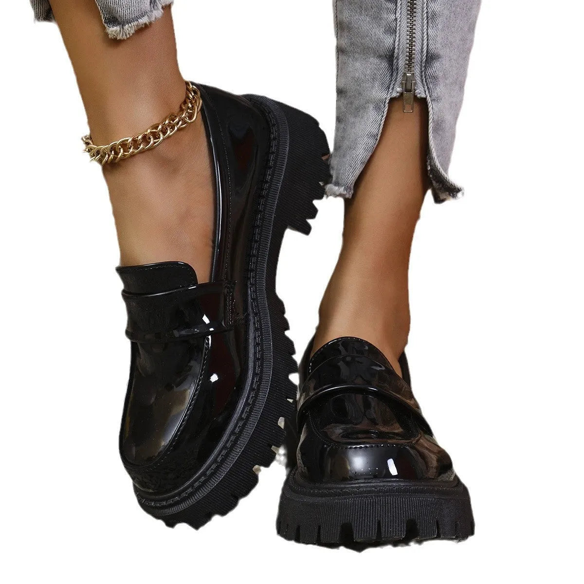 Black plus size women's loafers with a chunky platform heel and slip-on design.