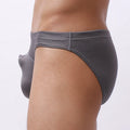Men's loose transparent nylon underwear in blue, showing breathable fabric on a size chart.
