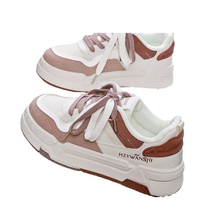 Children's beige thick-soled board shoes with cross shoulder strap lacing on a white background.