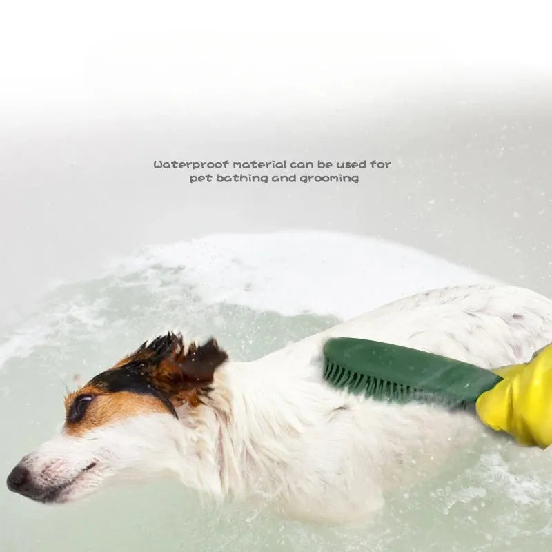 Pink and green handheld pet hair remover brush with grooming comb and integrated clothes hair collector.