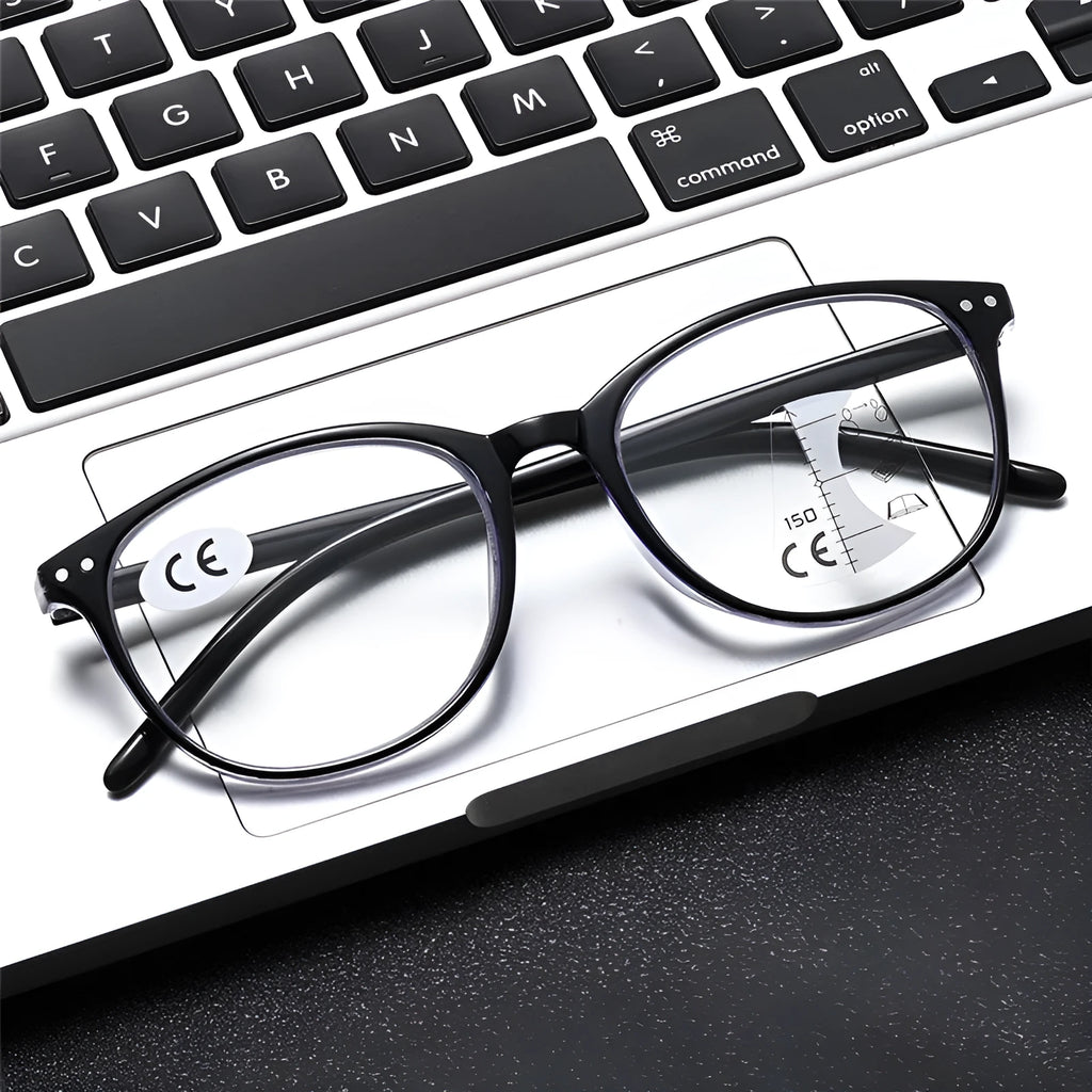 Women's ultra-light multi-focus presbyopic glasses in a choice of five frame colours on a plain background.