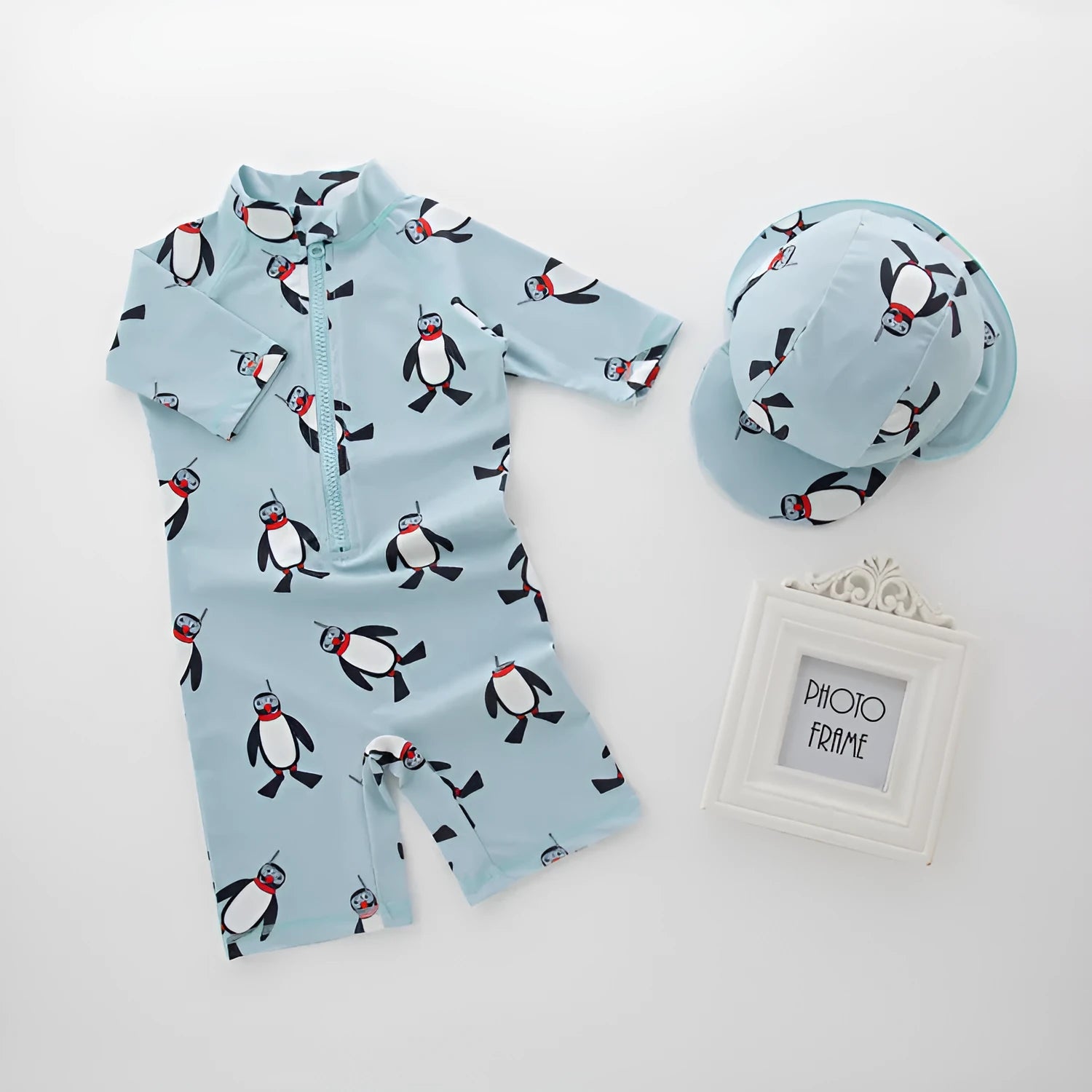 Boys' penguin print long sleeve swimsuit set with matching swimming cap for sun protection