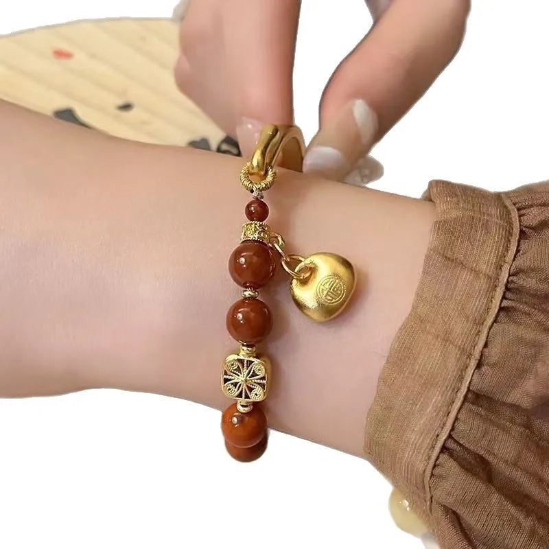 Golden South Red Agate character ingot half bracelet for women in antique style.