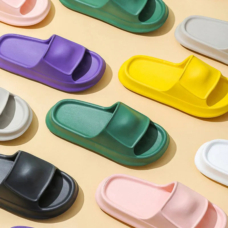 Soft unisex EVA house slippers with a thick non-slip sole in multiple colours.