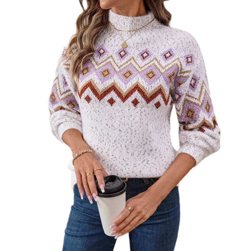 White chunky knit sweater with a geometric jacquard pattern and a half-turtleneck collar.