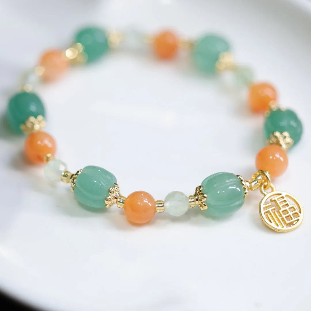 Traditional Chinese Duobao pumpkin bracelet with Jinsi Jade barrel beads and Prehnite accents