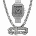 Roman numeral quartz watch with square diamond-studded dial and black mesh band, shown with matching bracelet and necklace.