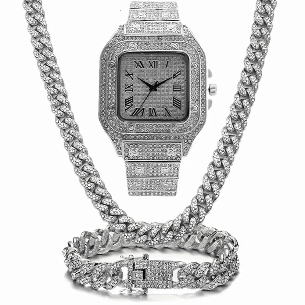 Roman numeral quartz watch with square diamond-studded dial and black mesh band, shown with matching bracelet and necklace.